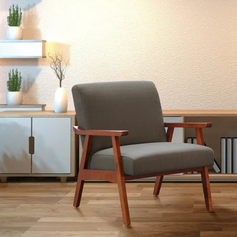 Poltrona Karkkila Mid-Century imbottita con gambe in legno