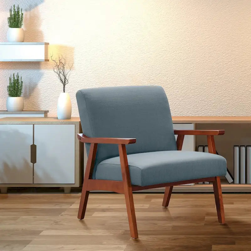 Poltrona Karkkila Mid-Century imbottita con gambe in legno