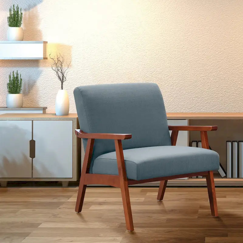 Poltrona Karkkila Mid-Century imbottita con gambe in legno