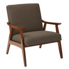 Poltrona Karkkila Mid-Century imbottita con gambe in legno